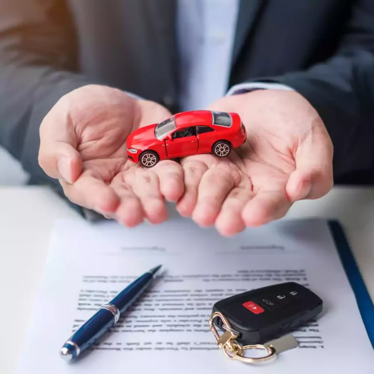 businessman-hand-holding-red-car-toy-with-vehicle-keyless-pen-contract-document-buy-sale-insurance-rental-contract-agreement-concepts