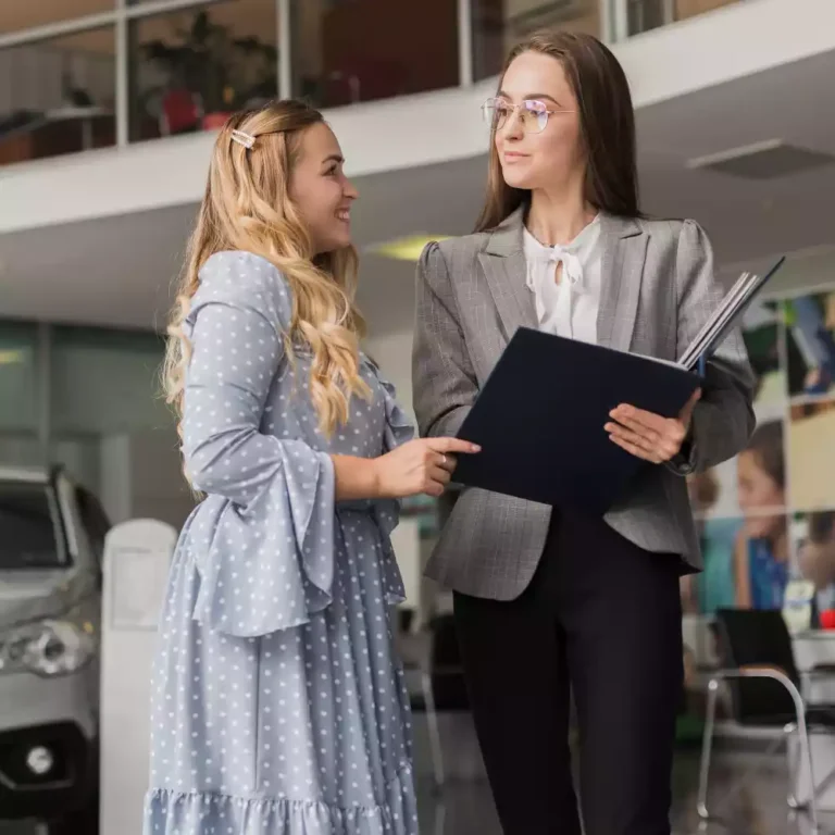 car-dealer-talking-with-blonde-woman